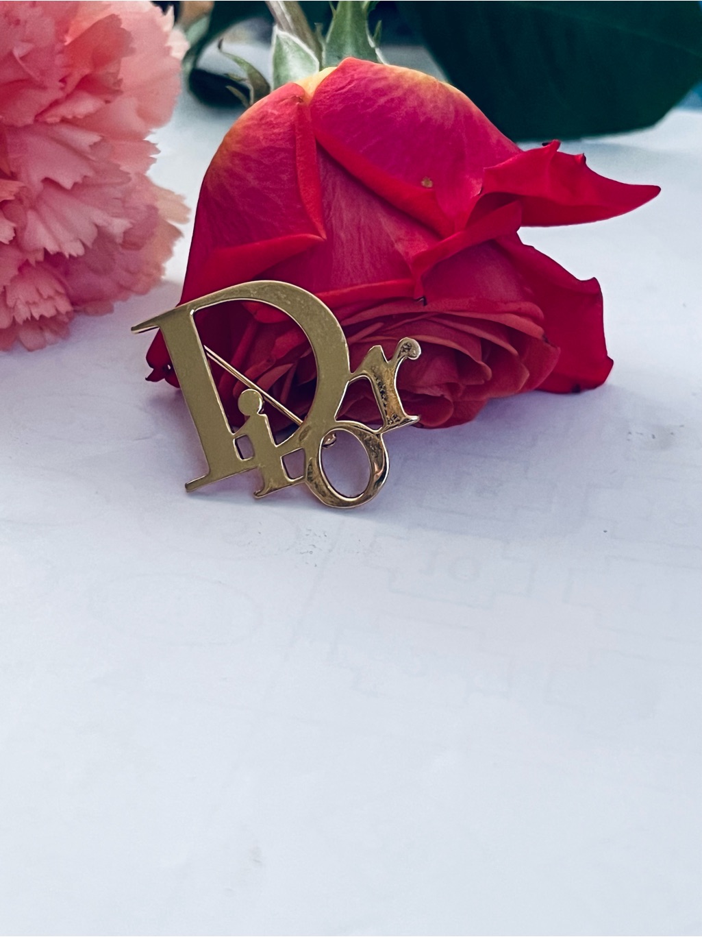 Dior Gold Logo Pin With Red Accents